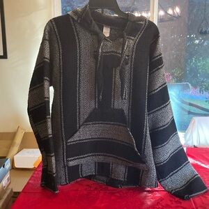 Pancho with follow  through pocket ties at the neck🤩
